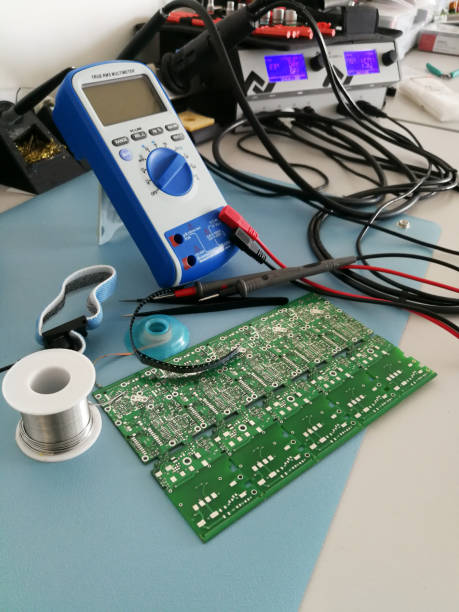 istock Close up of manual electronic tools and equipment on the electronics engineer desktop 957583146