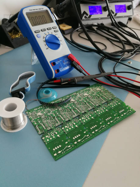 istock Close up of manual electronic tools and equipment on the electronics engineer desktop 957583158