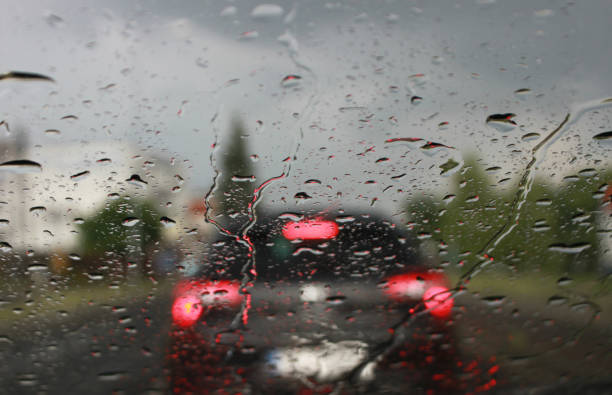 istock Dangerous vehicle driving in heavy rain. 957584236