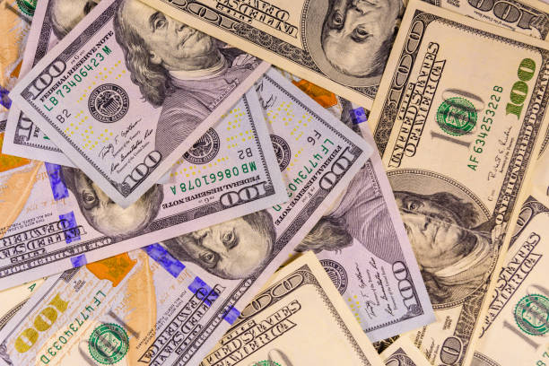 istock Background of the one hundred dollar bills 957596528