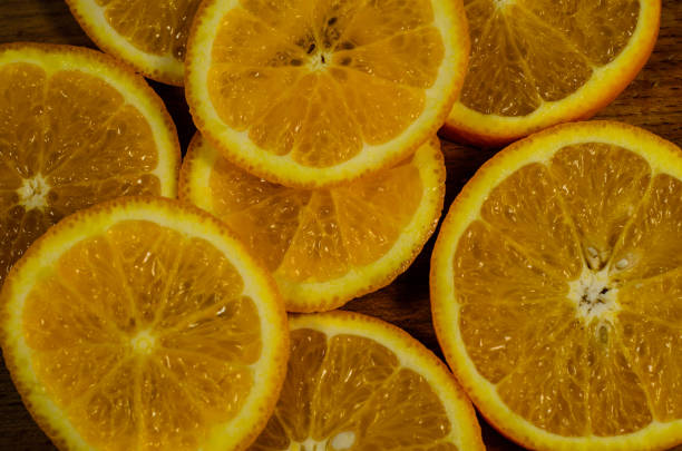 istock Background of the orange slices. Top view 957596558