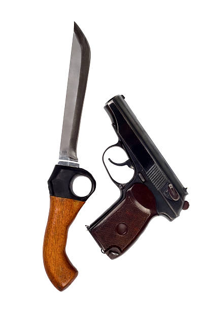 istock Knife and pistol. Isolated on white background 95760514