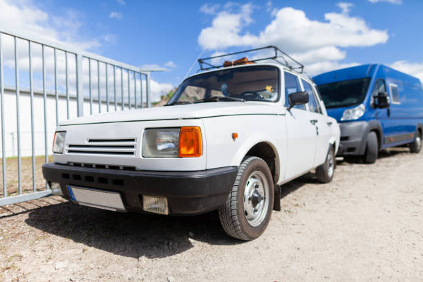 istock White german oldtimer car stands on gravel road 957612456