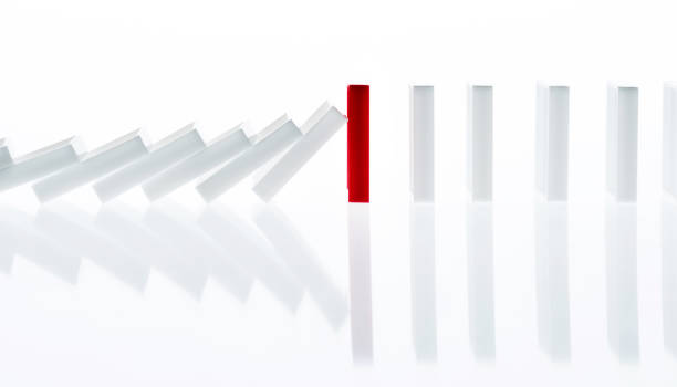 Stop the domino effect Stop the domino effect. domino photos stock pictures, royalty-free photos & images