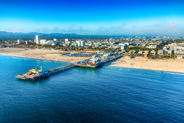 Santa Monica Pier Aerial The pier in the city of Santa Monica, California along coastal Los Angeles County about 15 miles west of downtown LA, shot from an altitude of about 1500 feet. santa monica stock pictures, royalty-free photos & images
