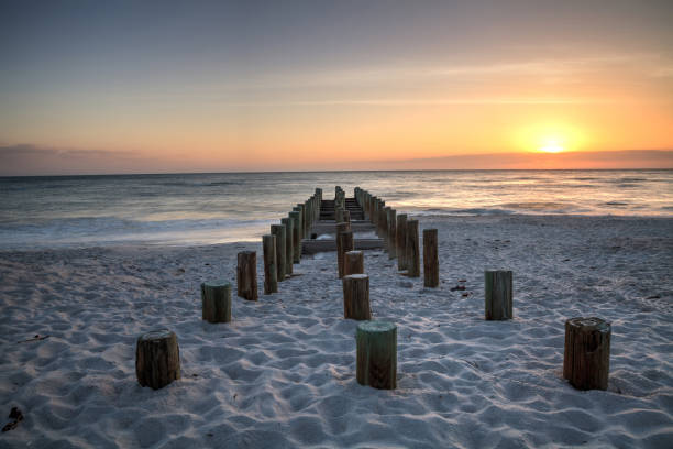 istock Ruins of the old Naples Pier at sunset 957620320