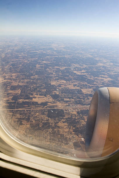 istock Looking out an Airplane window over the Midwest 95762253