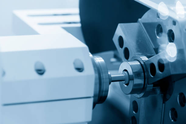 istock The CNC lathe machine grinding the metal ring gage. 957624376