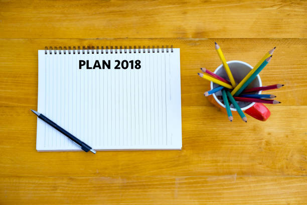 istock Plan 2018 Notebook business team meeting  with an Plan 2018 957632738