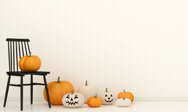 istock Interior with a black chair and pumpkins 957633610