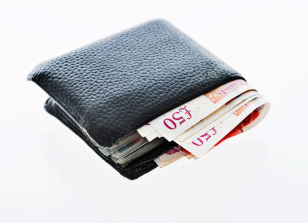 A black purse with some pounds.