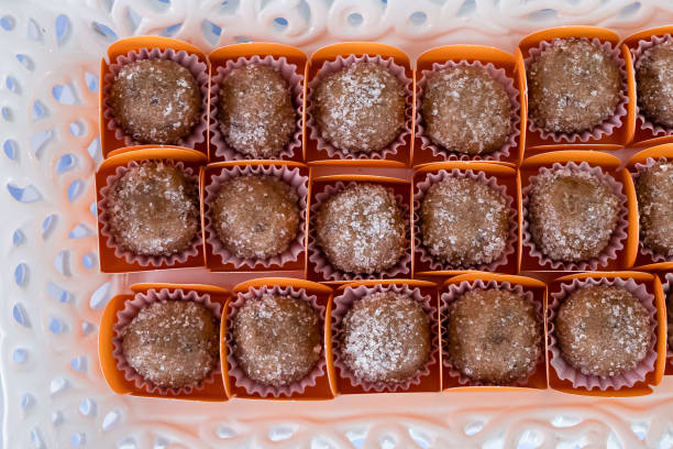 Brazilian sweets called brigadeiro, distributed on party table to be consumed