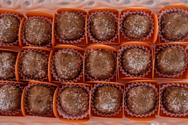 istock Brazilian sweets called brigadeiro, distributed on party table to be consumed 957646732