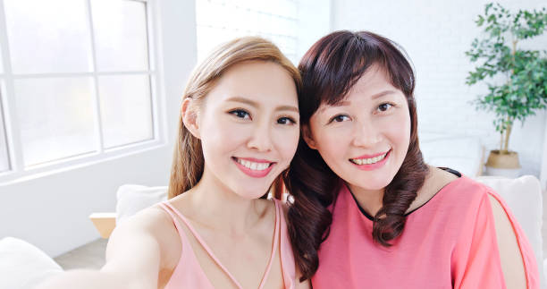 istock daughter selfie with mother 957646898