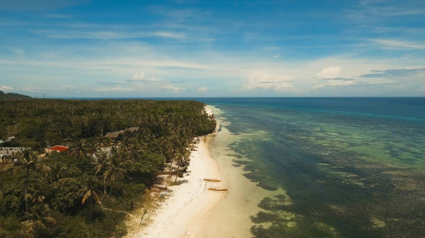 istock Aerial view beautiful beach on a tropical island. Philippines, Anda area 957651406