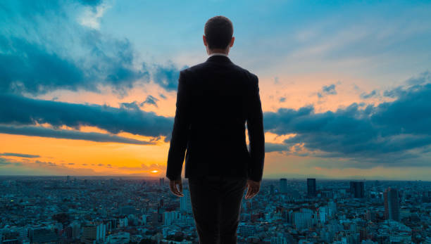 istock Modern city skyline and businessperson. 957654942