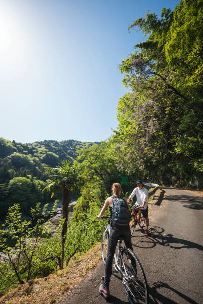 istock Young couple cycling in the mountains 957655798