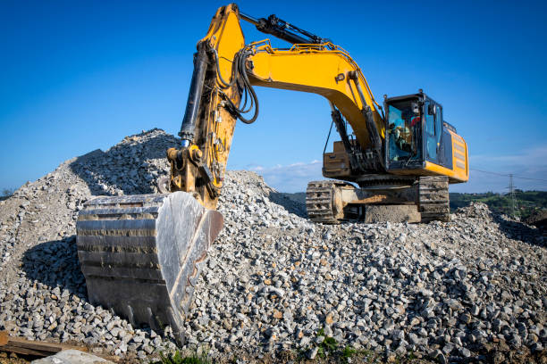 Yellow excavator on highway construction S7, Rabka, Poland
