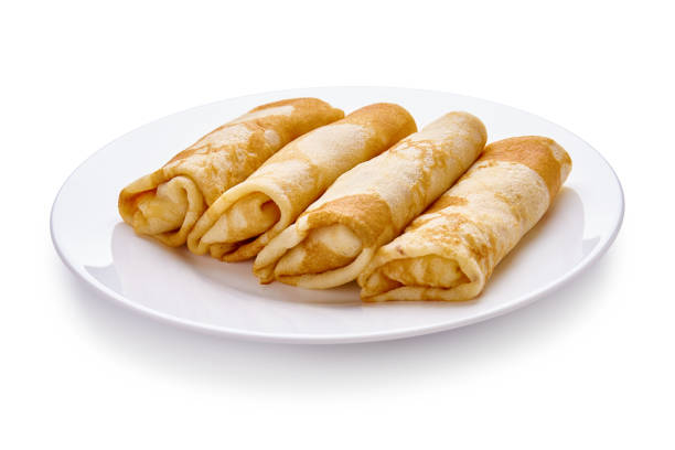 Delicious pancakes with cheese on white plate isolated on a white background