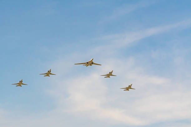 Strategic supersonic bomber Tu-160 during Victory Day parade rehearsal Moscow, Russia - May 04, 2018: Strategic supersonic bomber Tu-160 during Victory Day parade rehearsal tu160 stock pictures, royalty-free photos & images