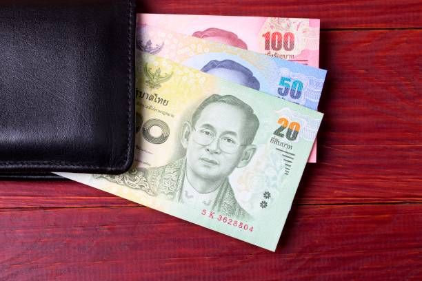 istock Thai money in the black wallet 957674544