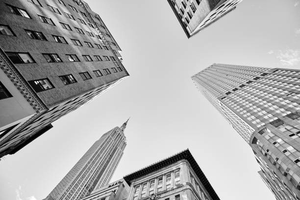 istock Looking up at Manhattan skyscrapers, New York. 957679620