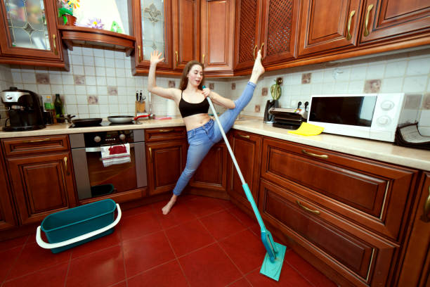 istock Cheerful apartment cleaner. 957684174
