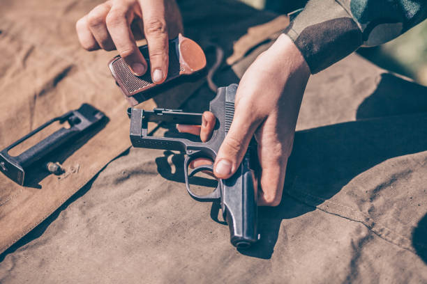 istock The instructor shows how to disassemble and assemble a Makarov pistol 957684612