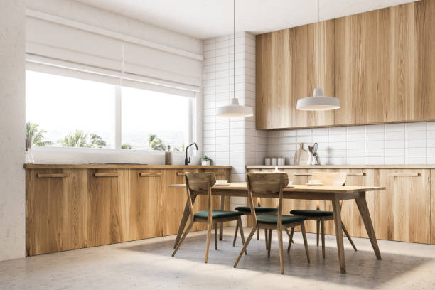 istock Corner of wooden kitchen and dining room 957684834