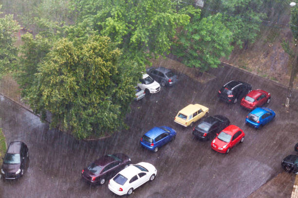 istock Cars parked in the rain 957685846