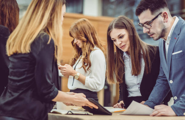 istock Business People Having a Meeting 957689630