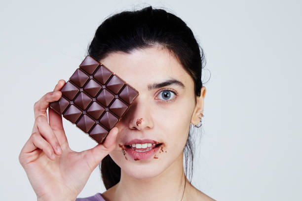 istock Young Woman holding chocolate 957697134