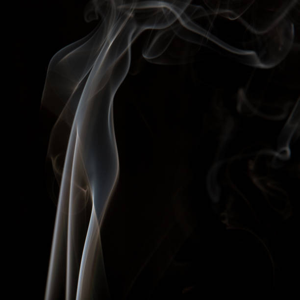 istock Smoke isolated on dark background. Abstract fumes 957697204