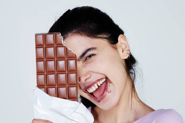 istock Young Woman holding chocolate 957697328