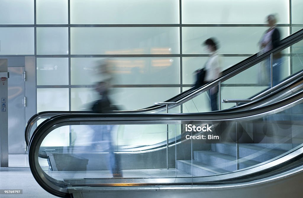 Personen auf Rolltreppe - Lizenzfrei Abschied Stock-Foto