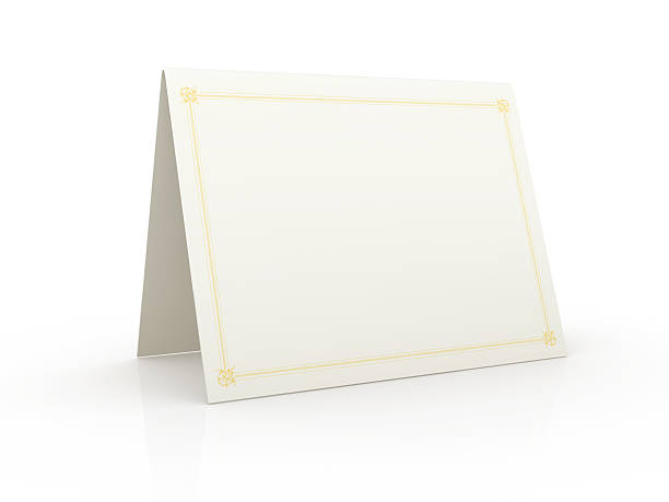 Tented blank white card on a white surface stock photo