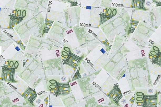 istock Pile of one hundred euro banknotes isolated on white background. 957700726