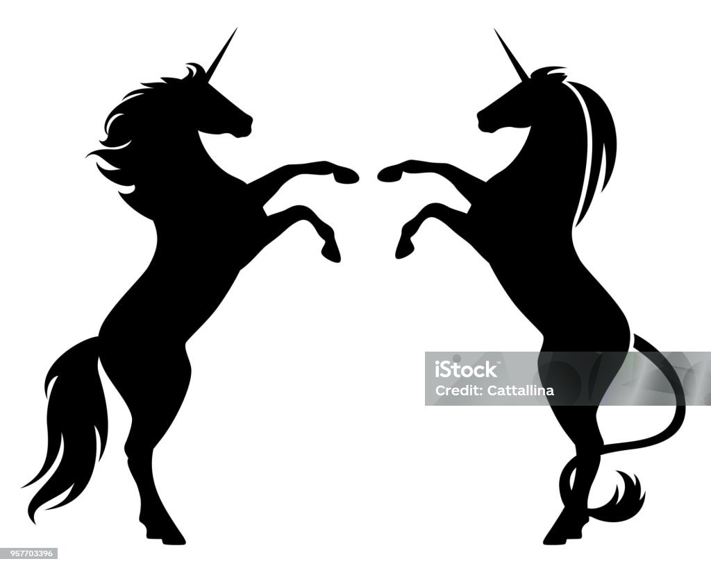 prancing unicorn horses black vector silhouette over white prancing unicorns side view heraldic style design Unicorn stock vector