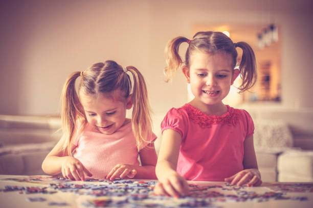 istock Two little  girls playing. 957704140