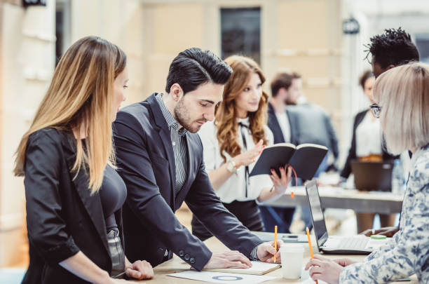 istock Business People Having a Meeting 957704838