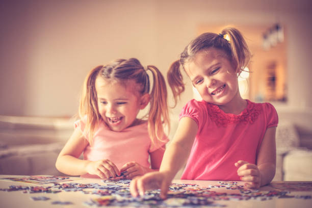 istock Sisters time. Little girls playing. 957707992
