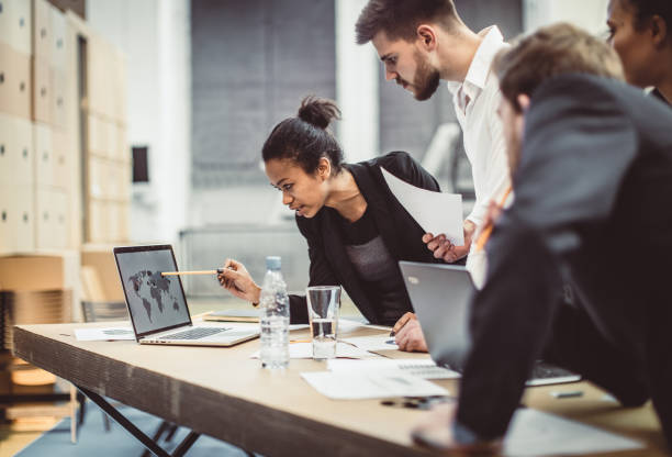istock Business People Having a Meeting 957708292