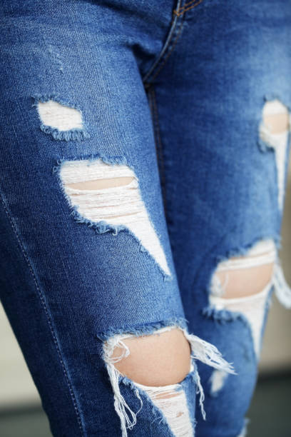 istock woman wearing lack blue jean denim. 957710348