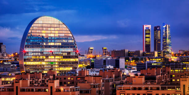 Madrid Financial district skyline at dusk. Spain Financial district in Madrid with 4 Torres, Kio towers and La Vela (BBVA city). Spain madrid stock pictures, royalty-free photos & images