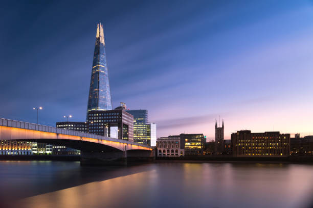 London Bridge and the Shard scenery London Bridge and the Shard scenery long exposure short taken after Sunset southwark stock pictures, royalty-free photos & images