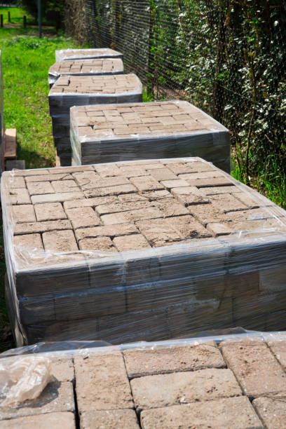 istock heap of red bricks in plastic bag on construction site 957736176