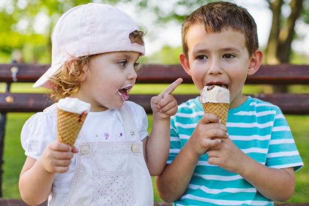 istock children eating ice cream 957741270