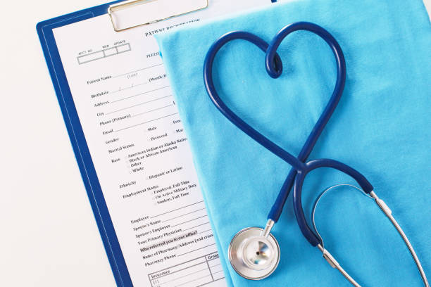 istock A stethoscope shaping a heart on a medical uniform, closeup, selective focus 957745838