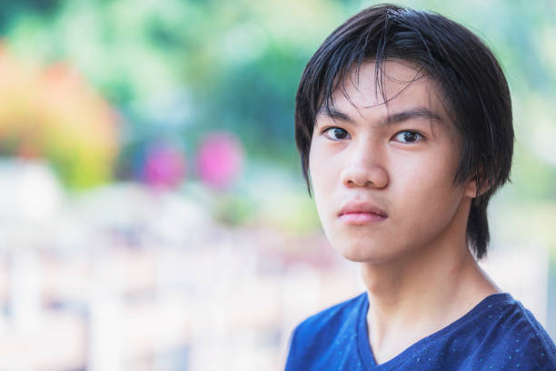 Confident young man lookin towards the camera