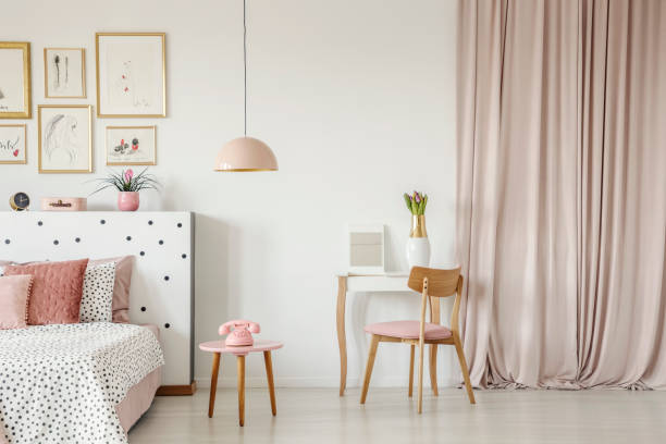 istock Pastel pink bedroom interior 957764536